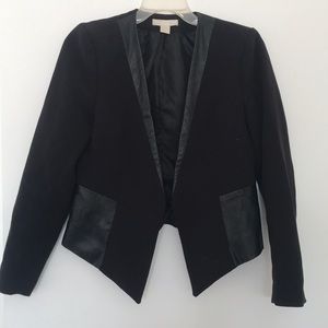 Women’s black faux leather blazer